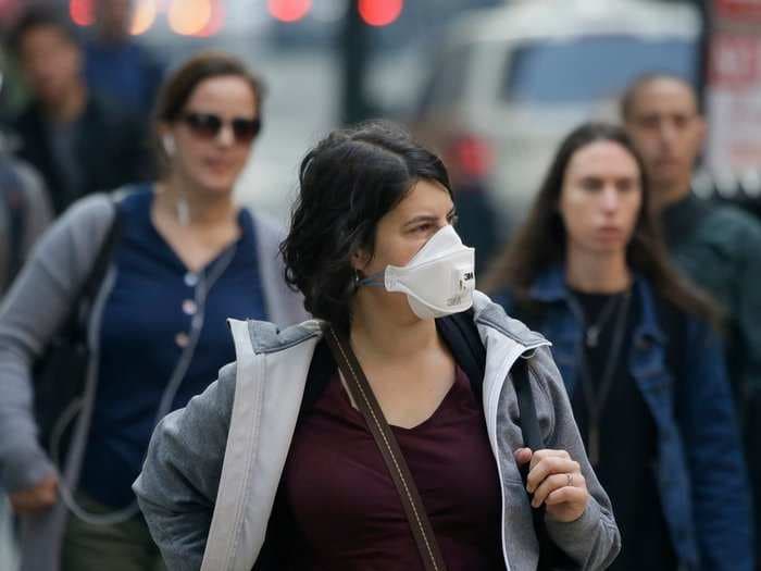 People are donning respirator masks as air quality worsens in San Francisco, and it's locking them out of Face ID