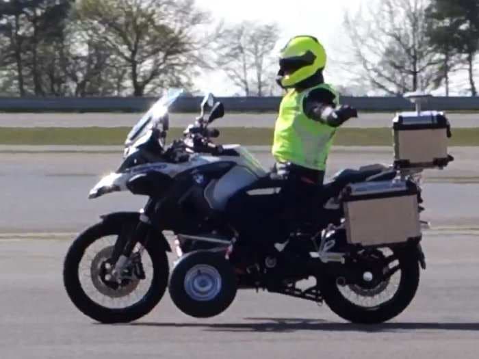 Watch BMW's self-driving motorcycle accelerate, turn, and brake to a stop