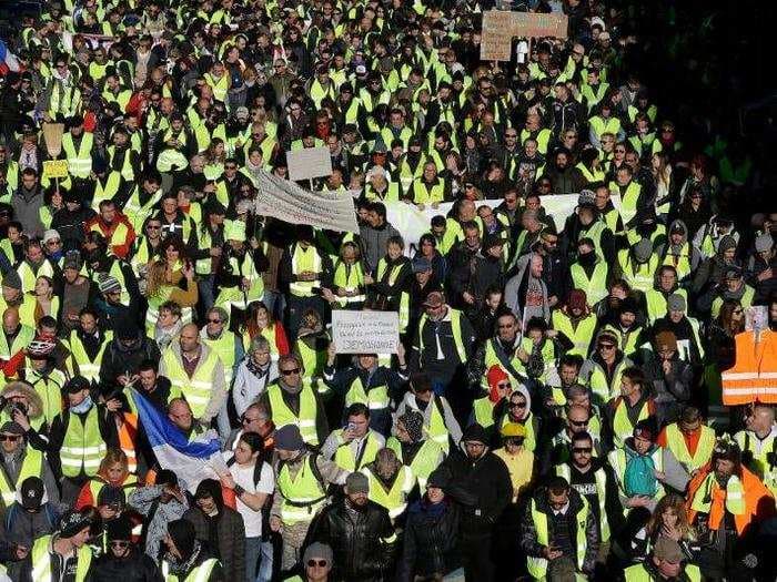 More than 1,300 were arrested and dozens injured after violent anti-government protests engulf France - here's how the clashes unfolded