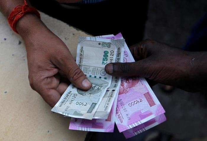 Here’s why the rupee will remain weak at least until Arun Jaitley’s budget speech
