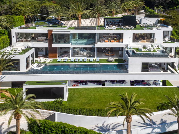 An LA mega-mansion listed at $250 million in 2017 has had its price slashed by $100 million, and it's still not selling - here's a look inside