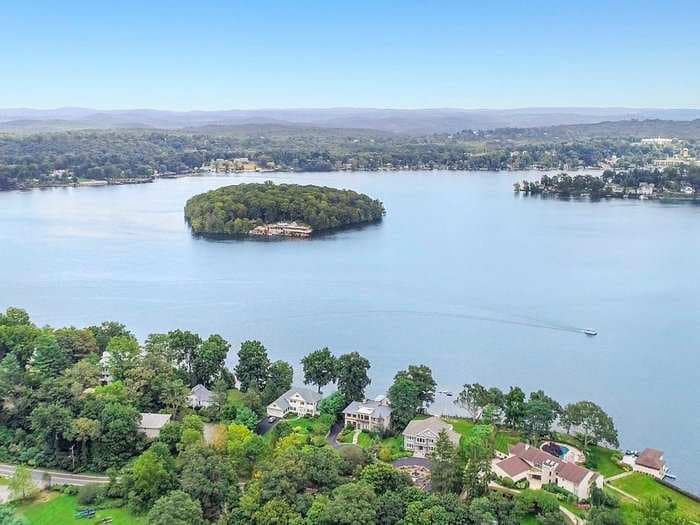 A private island an hour from NYC is for sale for $13 million, and it comes with 2 homes designed by Frank Lloyd Wright and a private helipad