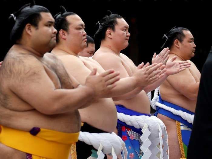 Sumo wrestlers eat up to 7,000 calories a day, yet don't typically suffer from symptoms of obesity