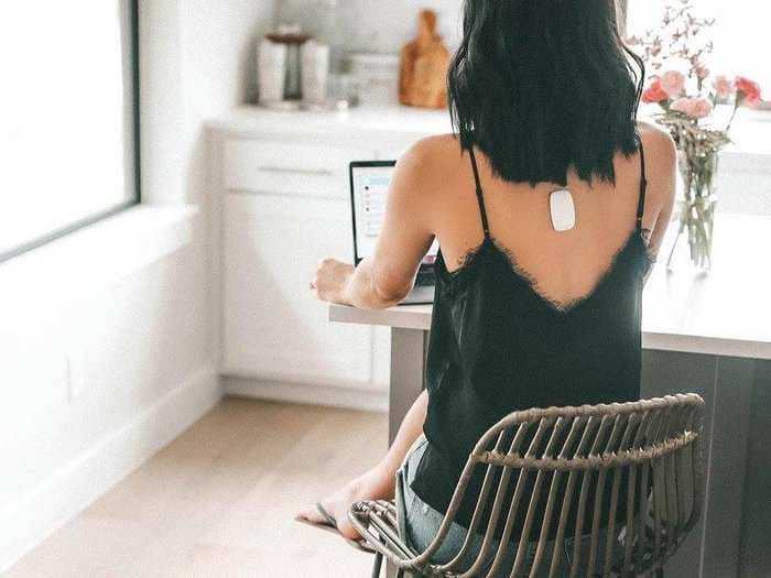 This small, discreet $80 device improved my posture and helped reduce my back pain - here's how it works