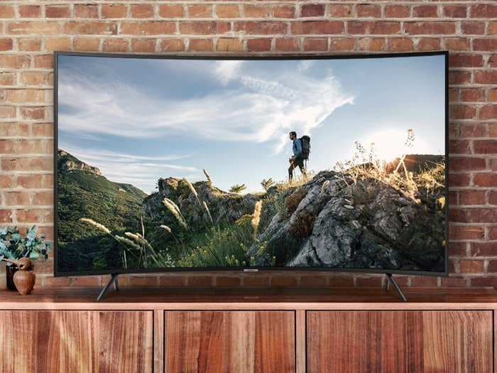 Walmart is selling a 4K 65-inch curved Samsung TV at half its original price - you can get it for $700