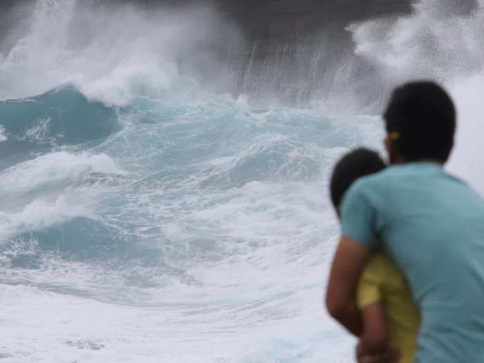 Hawaii's iconic Waikiki Beach could be engulfed by the ocean in 20 years - here's the plan to save it