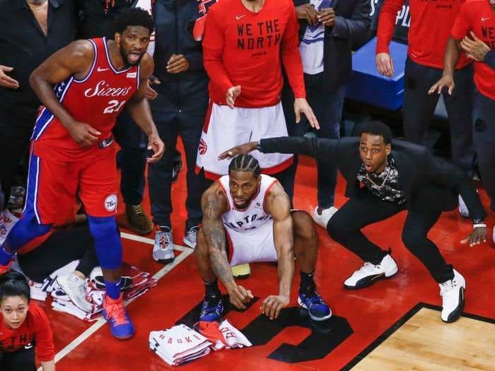 Stunning photo captured the Raptors and Sixers watching Kawhi Leonard's series-winning shot bounce around the rim