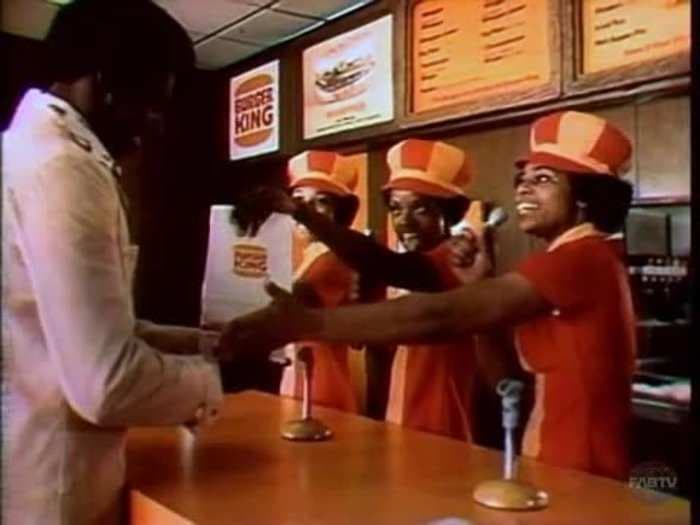 These vintage photos of Burger King's uniforms show how much the chain's look has changed over time - along with its identity