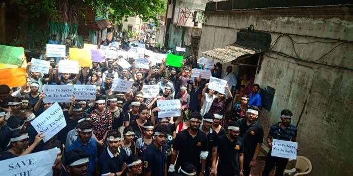 Indian doctors, who wore helmets and bandaids to work, are now on a day-long strike to protest violent attack in West Bengal