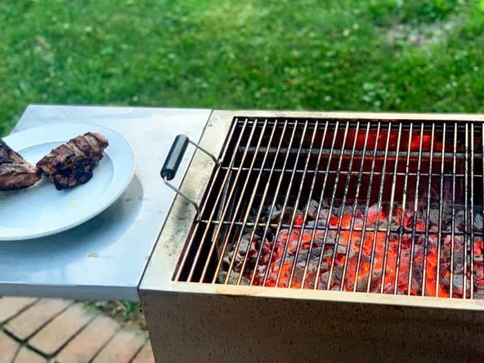 I left this $300 charcoal grill out in the wind, rain, sleet, snow, and salt for a year - here's how it has held up