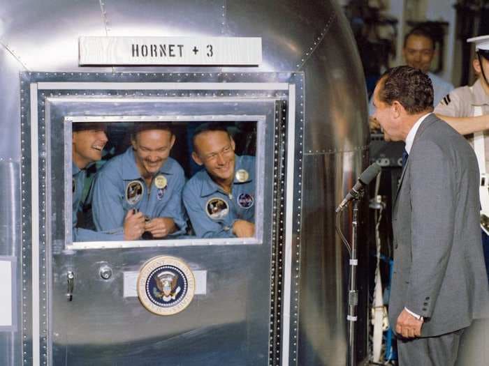 Bizarre photos show the Apollo 11 astronauts quarantined after returning from the moon as NASA worried they could infect Earth with space germs