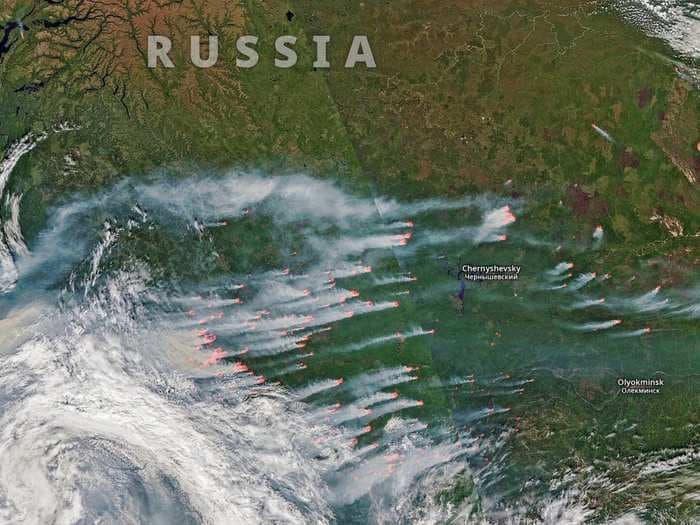 Satellite photos show massive swaths of the Arctic engulfed in flames by 'unprecedented' wildfires