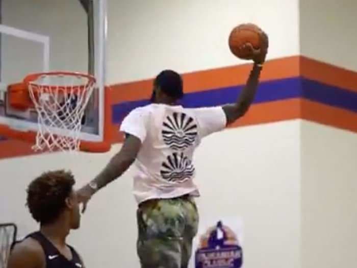 LeBron James went bonkers at his son Bronny's AAU tournament, dunking in the kids' layup line and celebrating so hard he lost his shoe