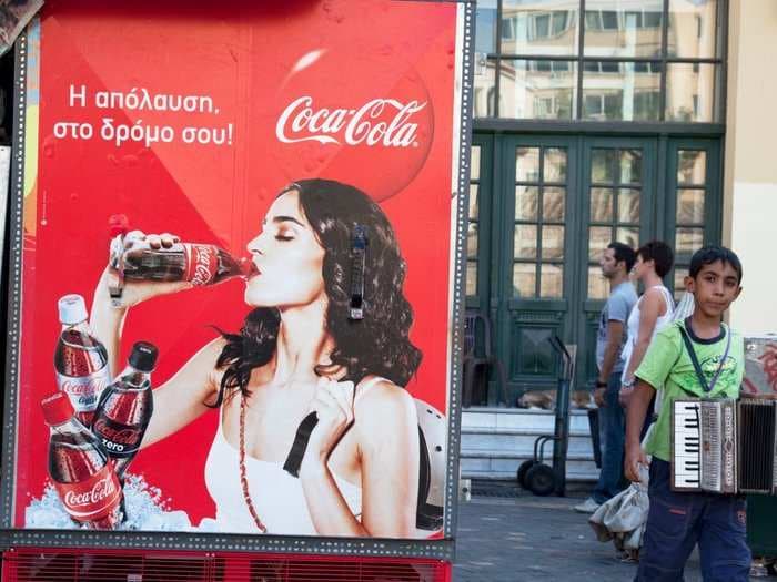 Coca-Cola is sold in all but 2 countries on Earth. Here's what their ads look like around the world.