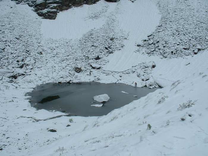 Hundreds of skeletons have been found in a mysterious Himalayan lake. A new analysis shows some of them died 1,000 years apart.