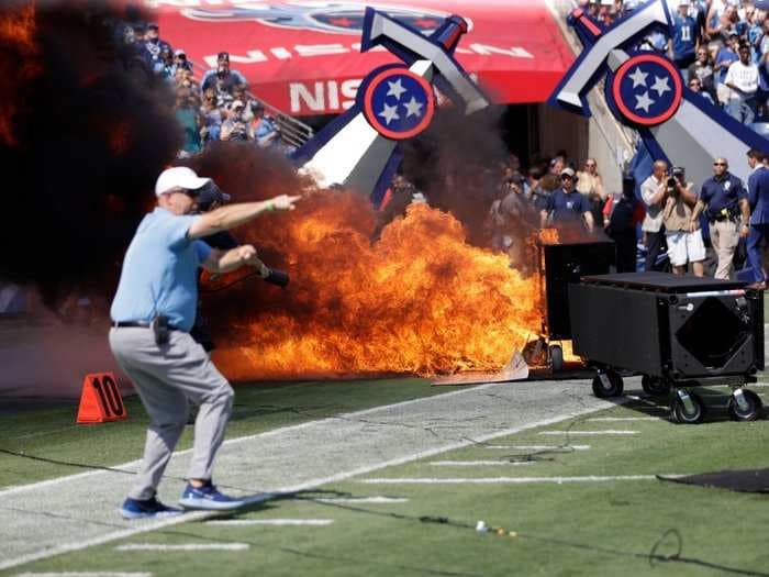 Fire erupts on Tennessee Titans field before NFL game when a pyrotechnics device malfunctioned