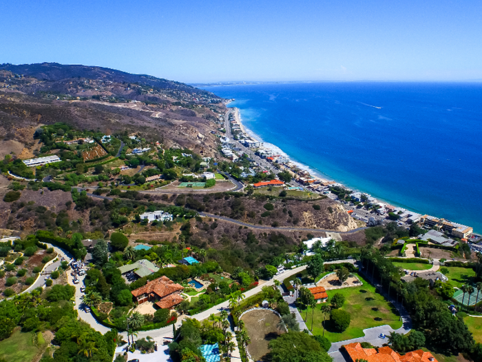 A mobile home in one of America's most exclusive trailer parks is on the market for $2.4 million. Here's a look inside the luxurious Malibu house.