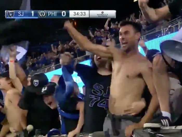 Chris Wondolowski served his one-game MLS suspension shirtless in the stands with a mob of fans