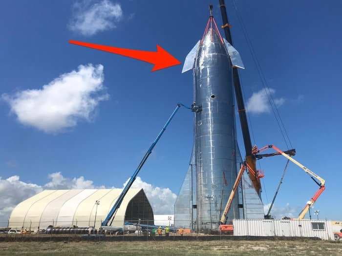 SpaceX just built a shiny 164-foot-tall rocket prototype in South Texas that looks like it came from Mars