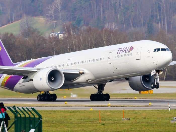 A Thai Airways plane was forced to abort its takeoff after an 'explosion' that left a huge hole in one of its engines