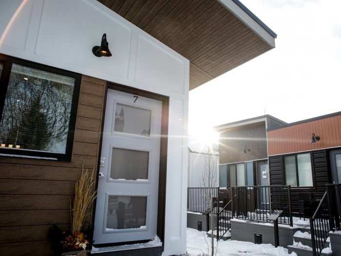 A village of 15 tiny houses designed for homeless veterans just opened in a Canadian city, and it charges veterans $600 a month to live there until they get back on their feet