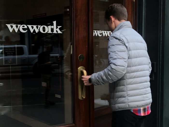 WeWork layoffs began on Monday, sources say, with one person calling it a 'small mercy'