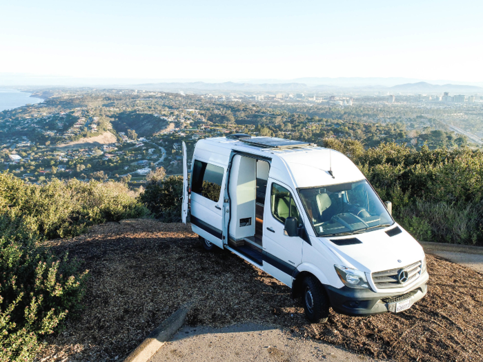 This Mercedes-Benz Sprinter was turned into a tiny home on wheels using wood from a 300-year-old Redwood tree - see inside