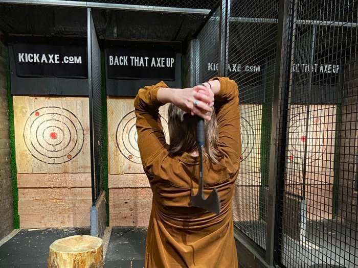 I went to a trendy axe-throwing bar and saw why the activity is blowing up with urban millennials