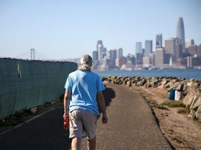 Residents of San Francisco's Treasure Island are seeking $2 billion in a class-action lawsuit and calling for the island's $6 billion redevelopment to halt until the land is free of contamination