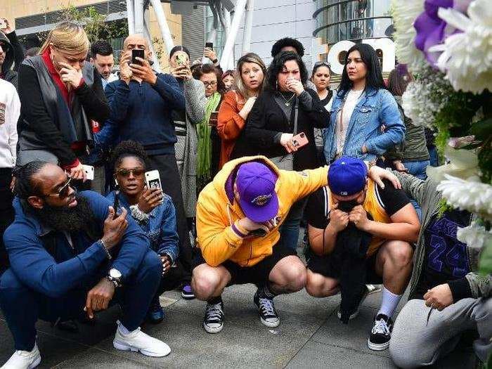 Photos and videos show makeshift Kobe Bryant memorials where fans are mourning the basketball legend who was killed in a helicopter crash on Sunday