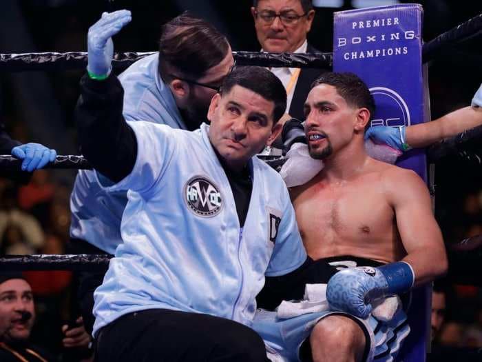 An American boxer's father screamed 'f--- him up for that!' when the opponent appeared to bite his son on the shoulder in the middle of a fight