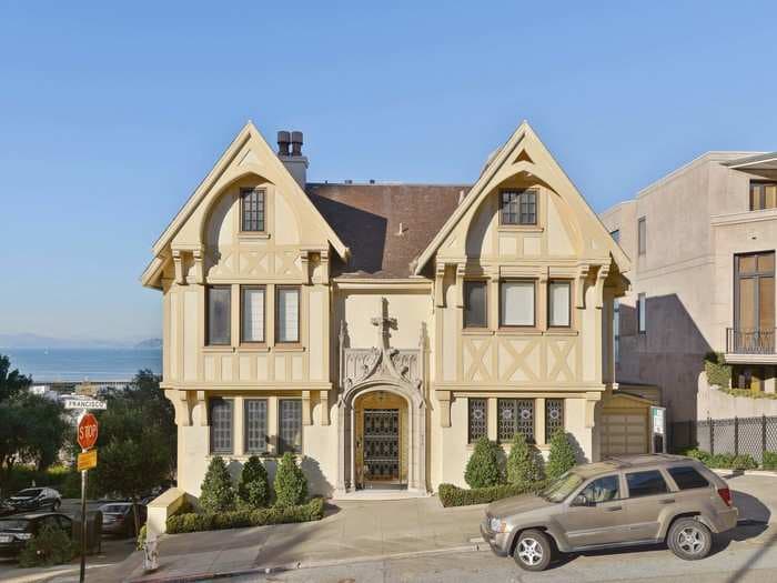 A picture-perfect San Francisco Tudor mansion made famous by a painting and owned by Nicholas Cage is on the market for $11 million - see inside