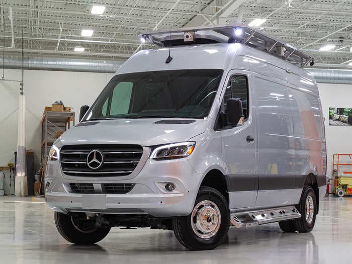 A camper van built in a Mercedes-Benz Sprinter comes with full kitchen, two showers, and a bed - see inside The Last Resort