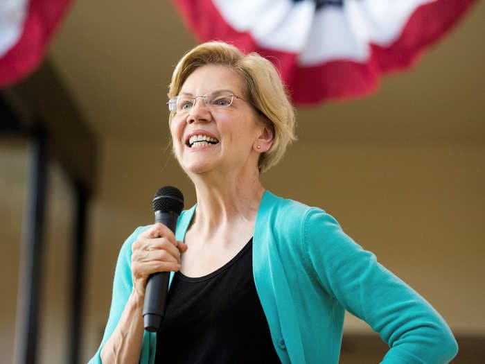 People left thank you notes next to Elizabeth Warren's photo at Harvard Law School where she was a tenured professor