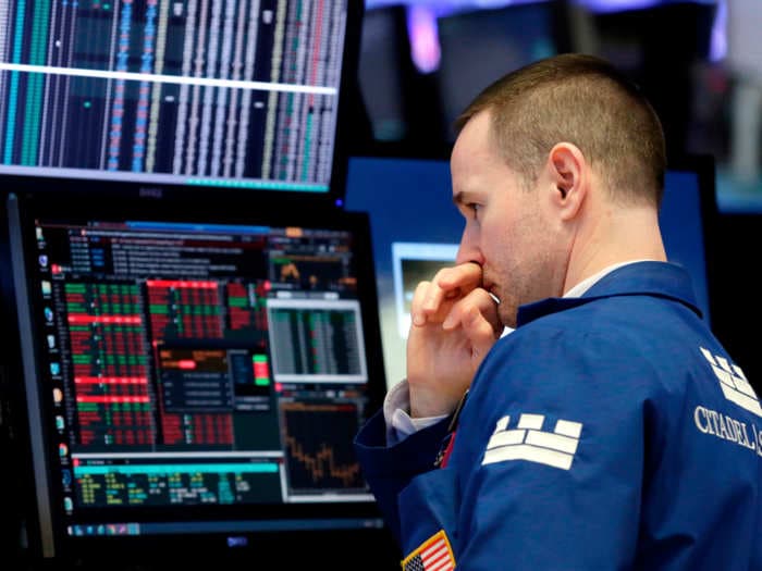 Dow plunges 2,700 points after trading halt as Fed's emergency actions fail to calm worries over coronavirus fallout