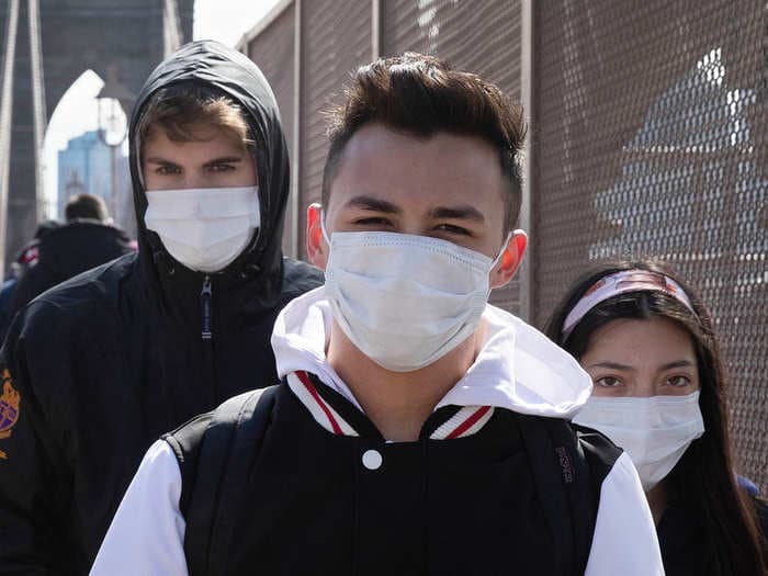 Some doctors treating coronavirus patients in New York are already reusing face masks because they're running out of supplies
