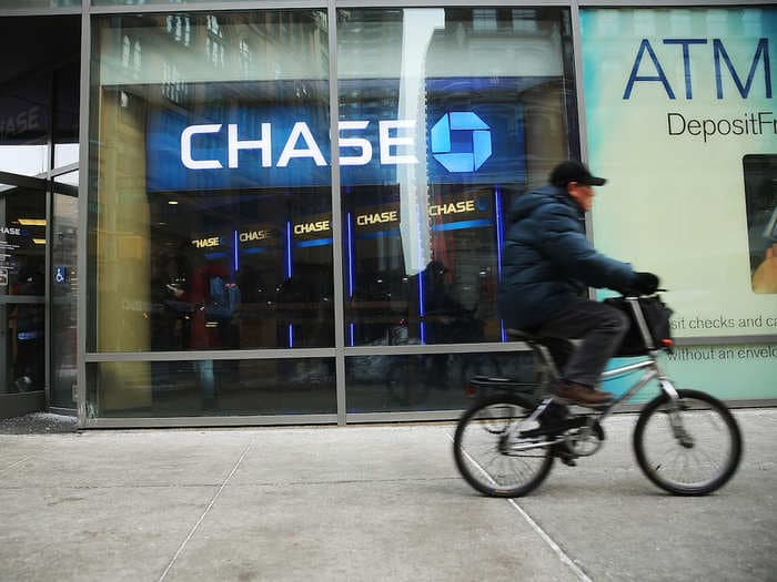 JPMorgan Chase is closing 20% of its branches and reducing staffing amid the coronavirus pandemic, but it will pay employees asked to stay home