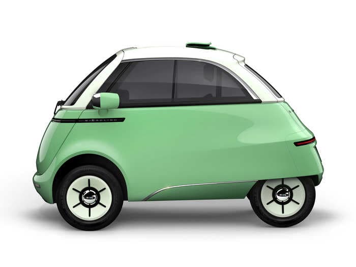 This adorable tiny Swiss electric 'bubble car' fits two people and can charge with a regular power outlet - see inside the $13,000 vehicle