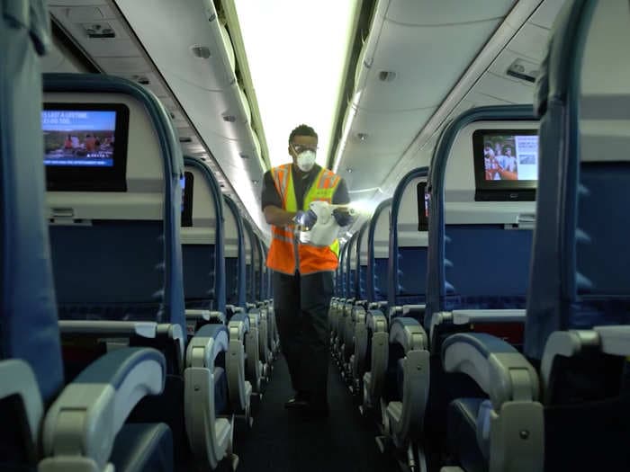 A Delta flight attendant describes what it's like flying during the coronavirus pandemic with near-empty planes and 'ghost town' airports