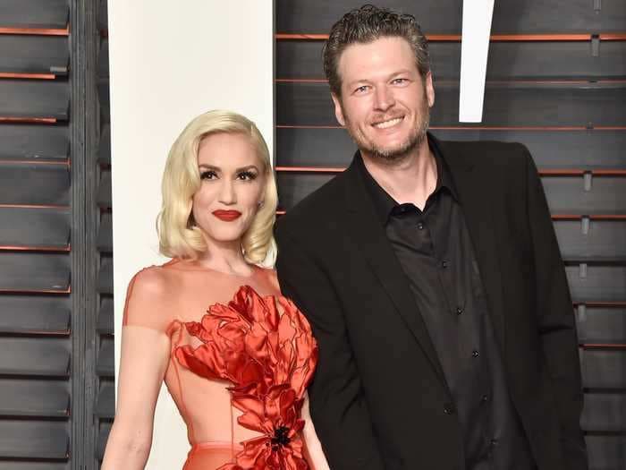 Watch Gwen Stefani take a razor to Blake Shelton's hair to trim his mullet