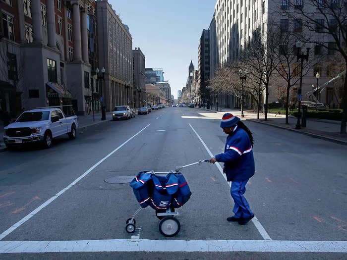 Hundreds of USPS workers have tested positive for the coronavirus, but it still may be safer to get postal mail than an Amazon package