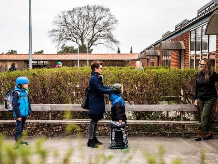 Photos of Danish children returning to school while staying six feet apart highlight the country's cautious approach to lifting its lockdown measures