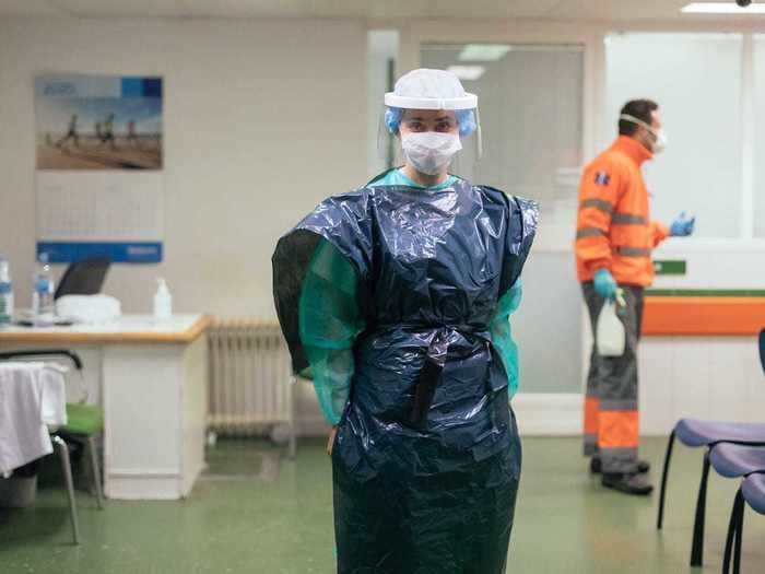 Photos show how shortages are forcing doctors and nurses to improvise coronavirus PPE from snorkel masks, pool noodles, and trash bags