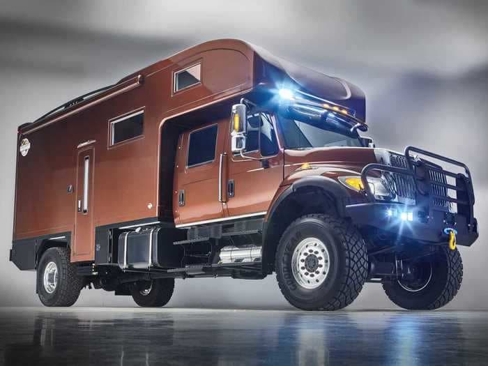 This $650,000 off-road RV built on a truck chassis fits a king-sized bed and a kitchen with an optional dishwasher — see inside