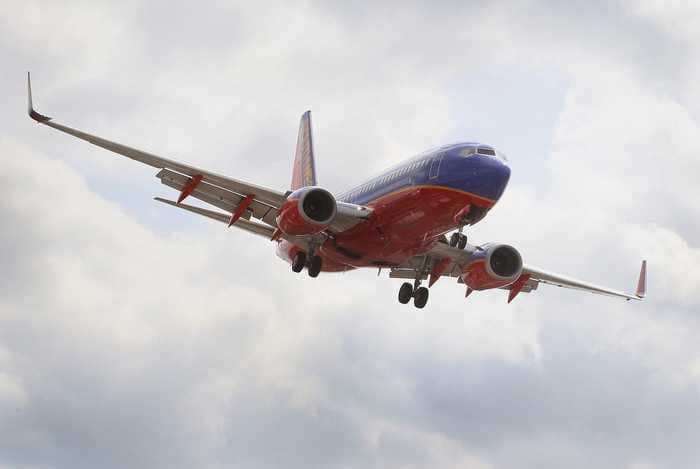 Southwest says it could take more than 5 years for business travel to get back to normal, as the airline reports its first loss since 2011 because of the coronavirus