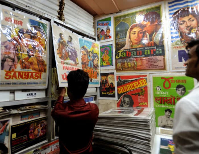 A film producer, a critic, and analysts explain an existential threat to Indian movie makers