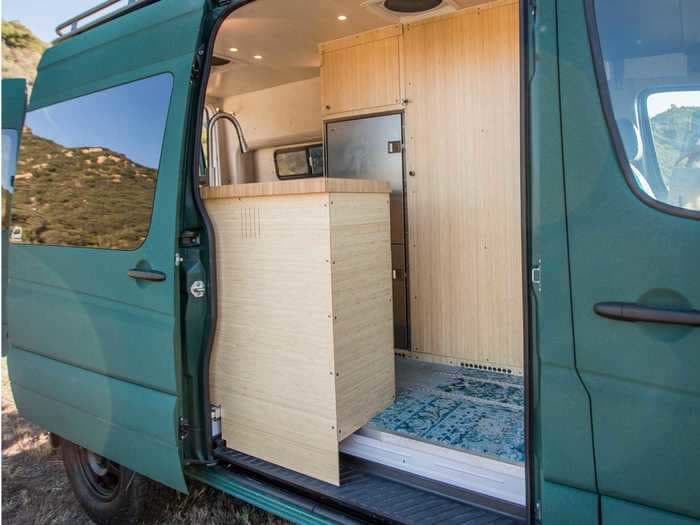 This custom camper van built on a Mercedes-Benz Sprinter includes a 'Japanese soaking tub' — see inside