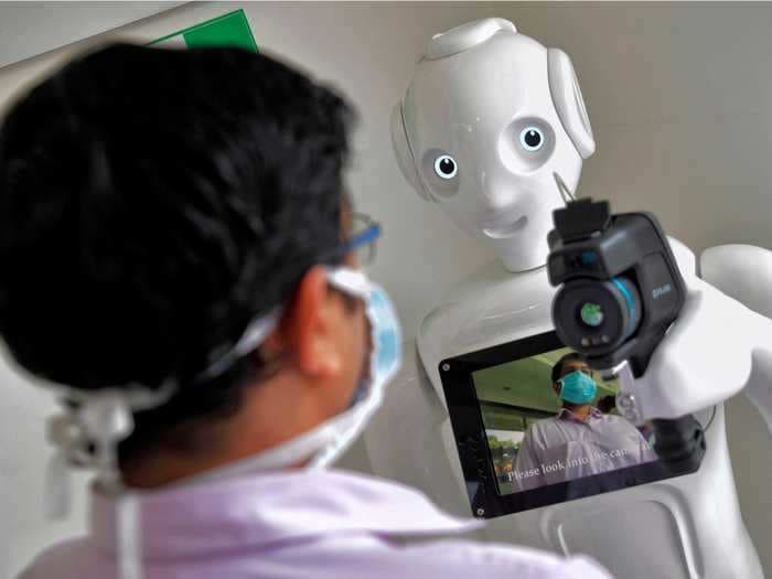 An Indian hospital is using robots with thermal cameras to screen coronavirus patients — here's how they work