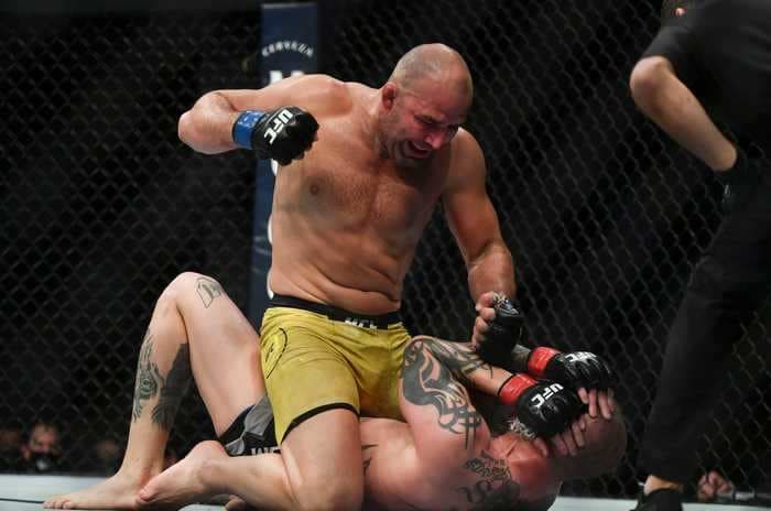 The veteran UFC fighter who knocked an American's teeth out said he knew he was doing damage because his fist hurt from all the punching