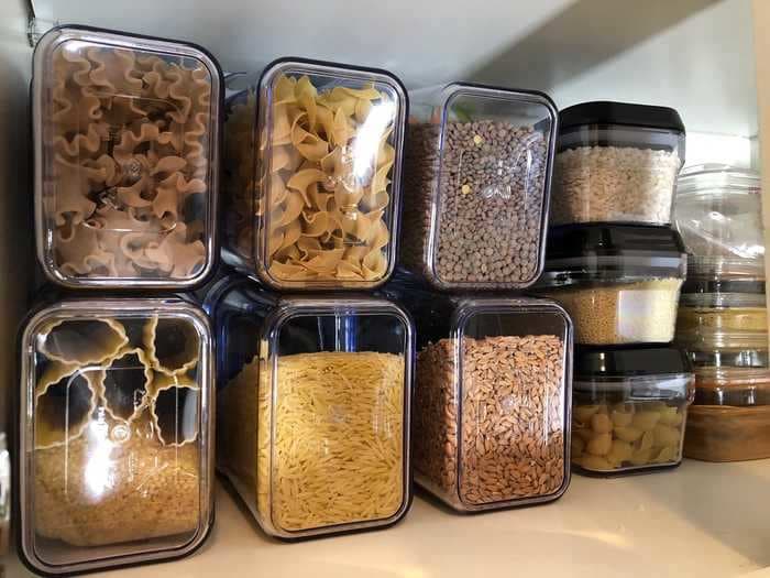 I organized my kitchen pantry with these air-tight storage containers and can finally see everything in my cabinets